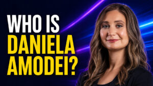 Thumbnail for “Who Is Daniela Amodei?” featuring bold yellow and white headline text beside a professional, neon-lit portrait of a woman on a dark blue and purple tech background. The design introduces a profile article about Anthropic’s president and co-founder, covering her career, family, and role in the AI industry.